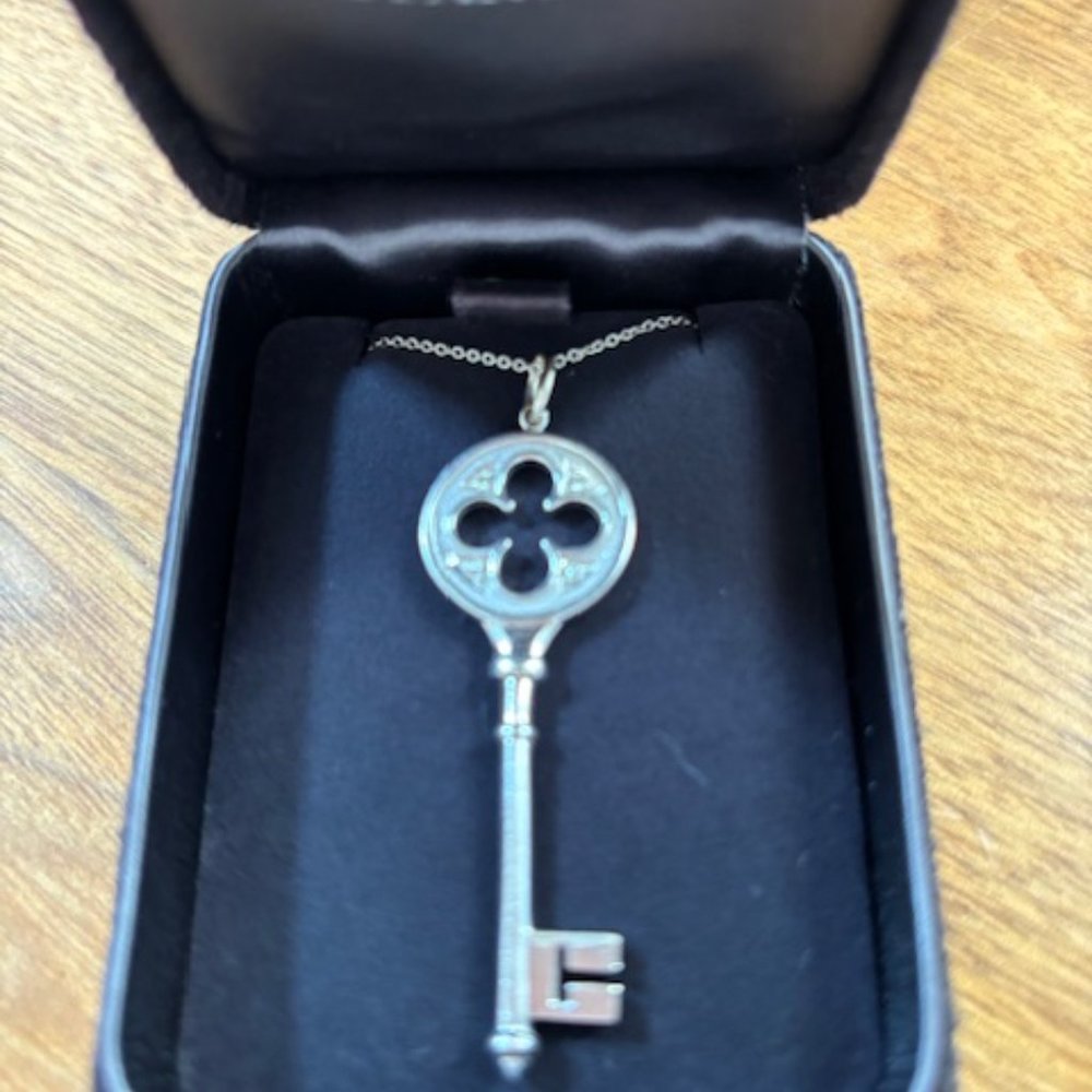Tiffany & Co 18K White Gold with Diamonds Quatrefoil Key Pendant Necklace